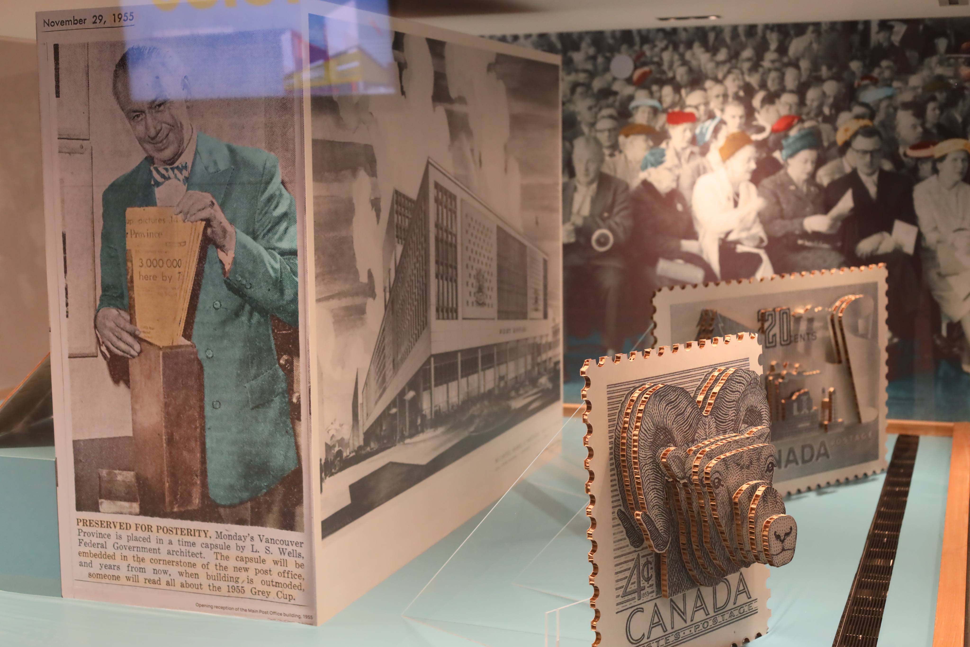 two people sitting on a ledge talking